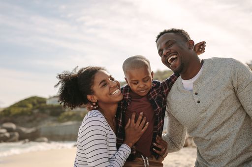 Family on beach Immigration attorney amanda marie oliveira law